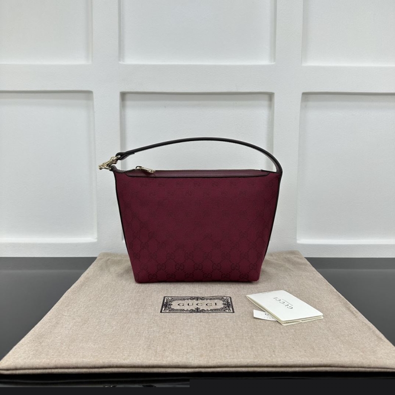 G*u*i top handle bags